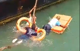 File photo of divers rescuing a baby thrown into the Indian Ocean.